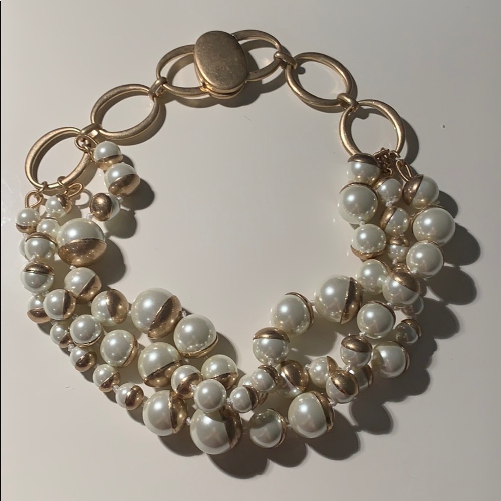 Statement necklace with pearls and gold hardware
